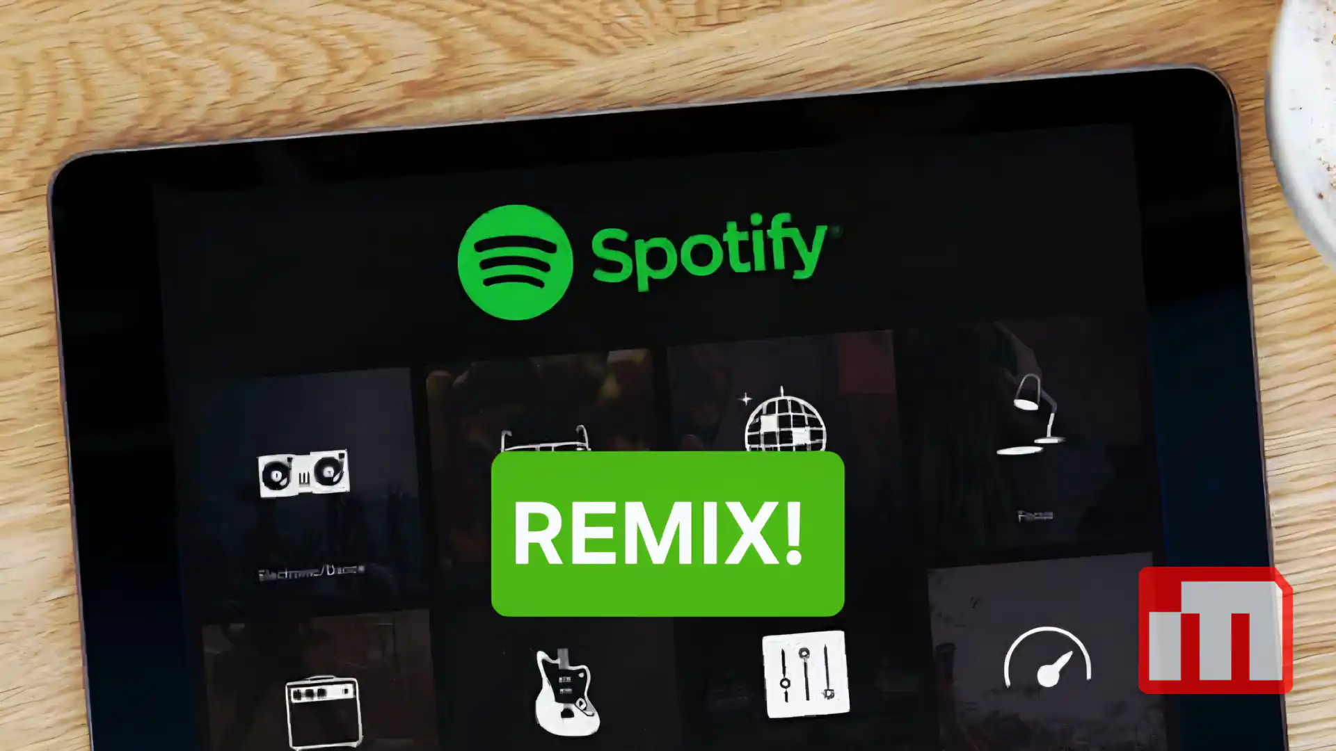 Tablet screen showing Spotify logo in bright green with a large green Remix! badge overlapping the UI icons on a wooden table background, suggesting a remix feature.